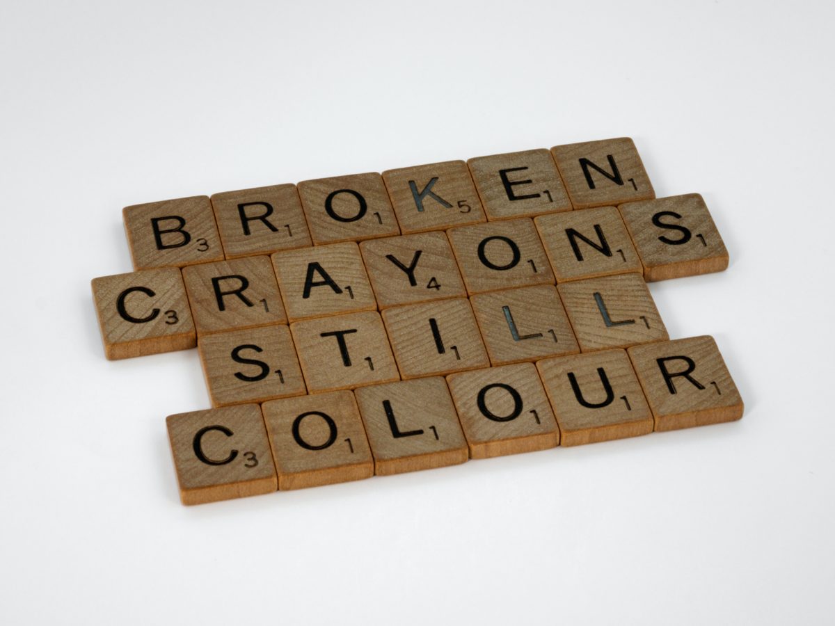Tiles spelling out "Broken Crayons Still Colour"
