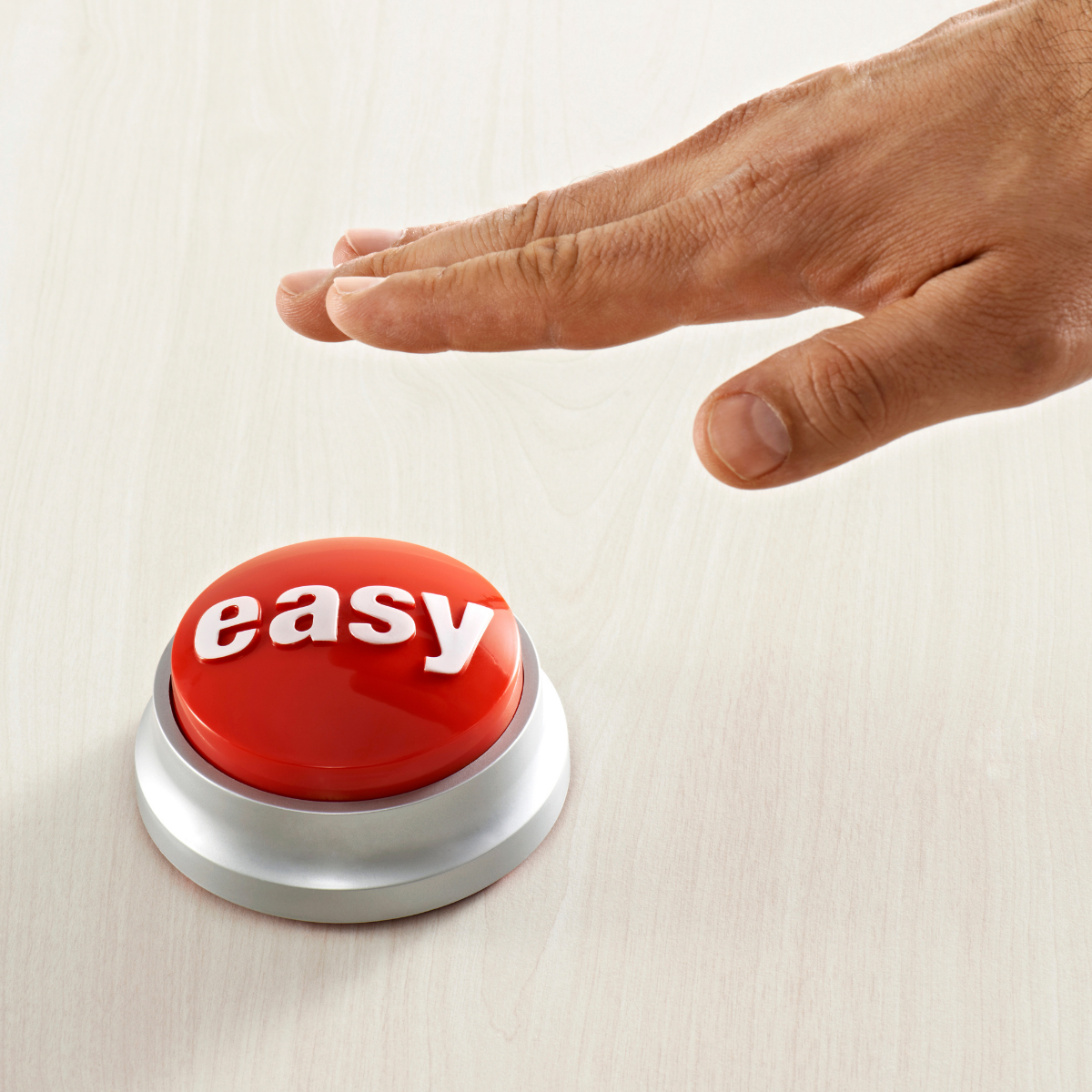 A hand about to push a red button marked "easy"