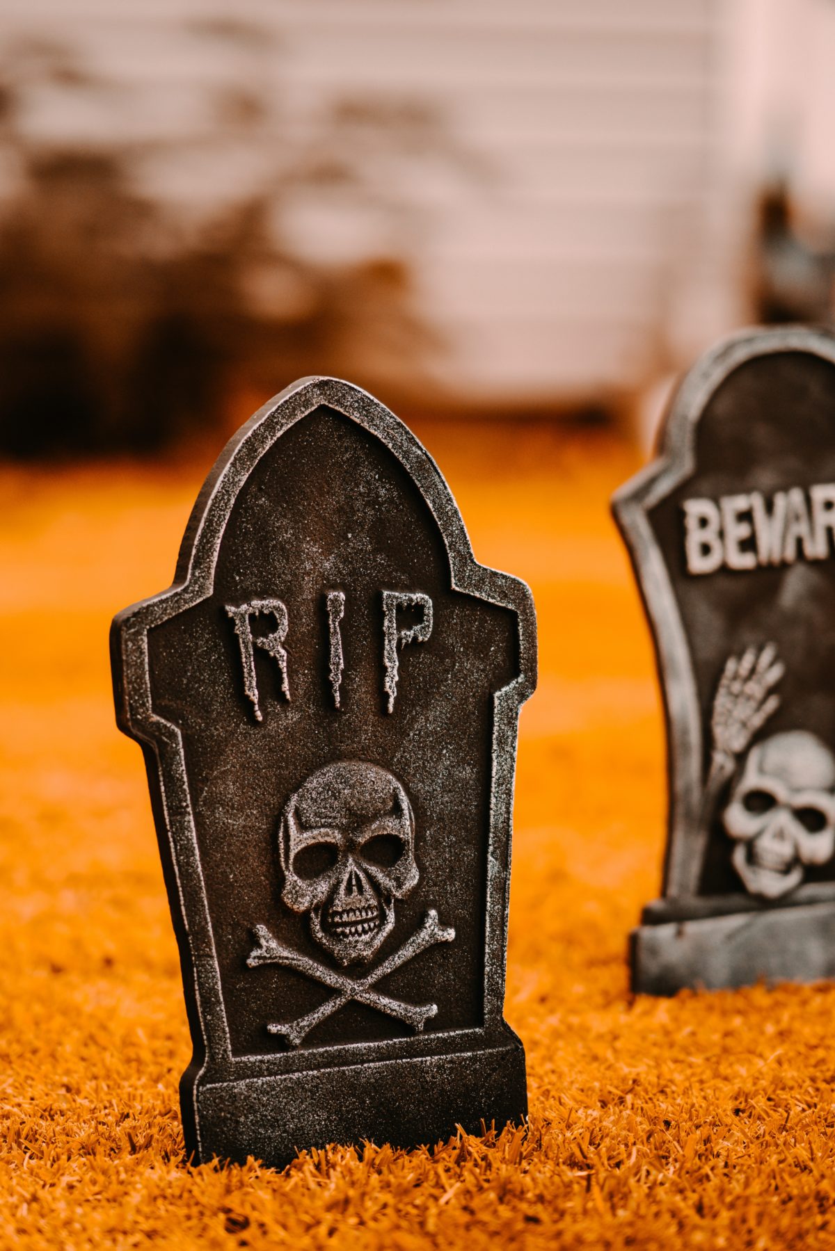 Gravestones with RIP and a skull and cross-bones.
