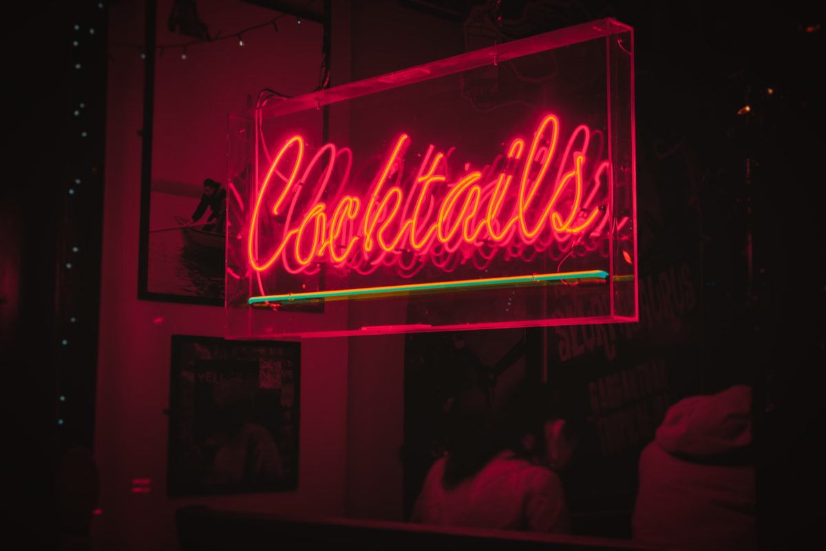Neon sign which says "Cocktails"