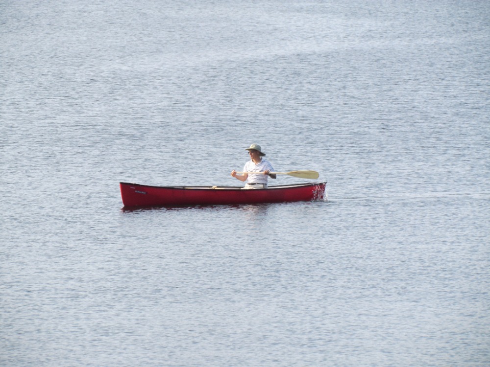 The author paddling a canoe.