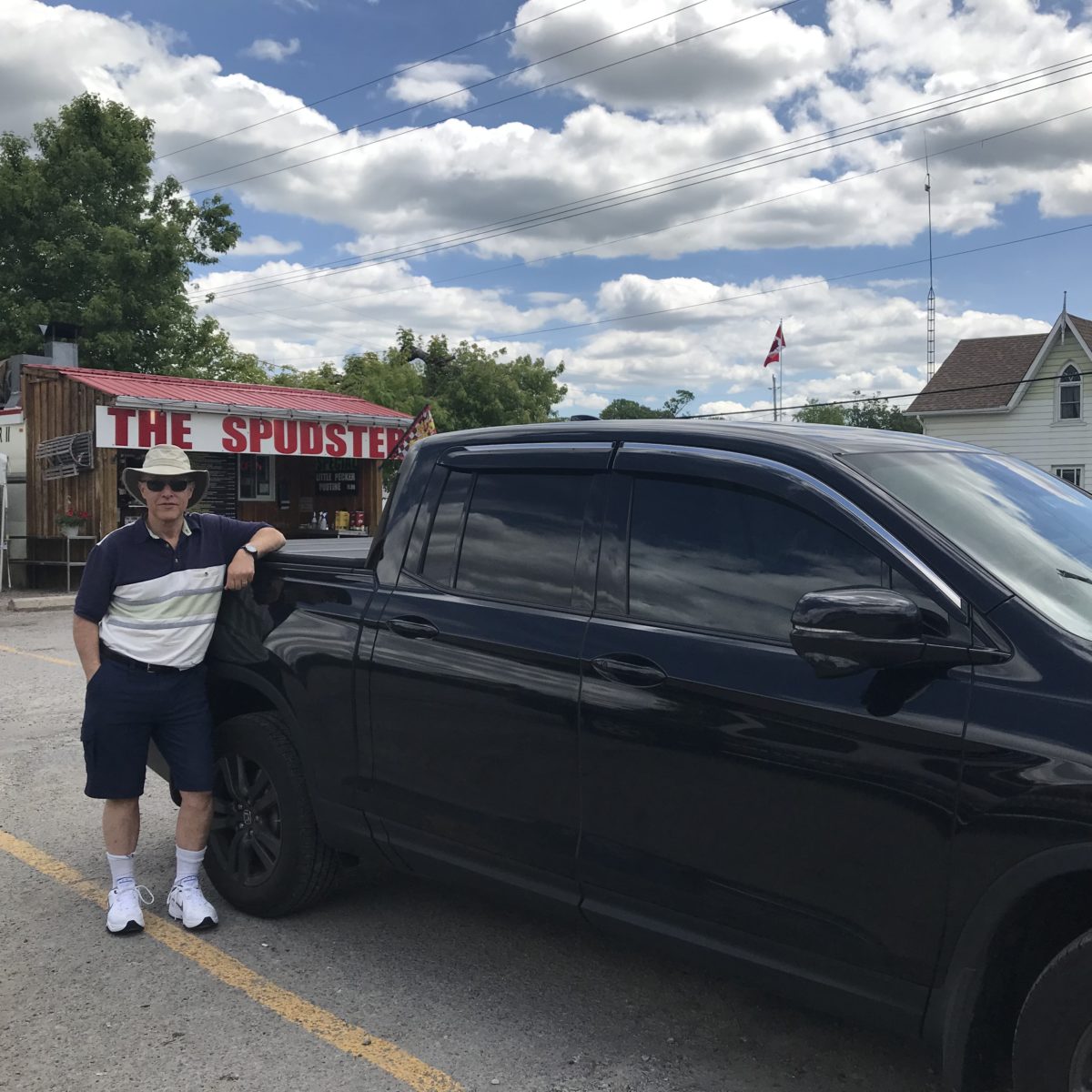 The author standing next to his pickup truck.