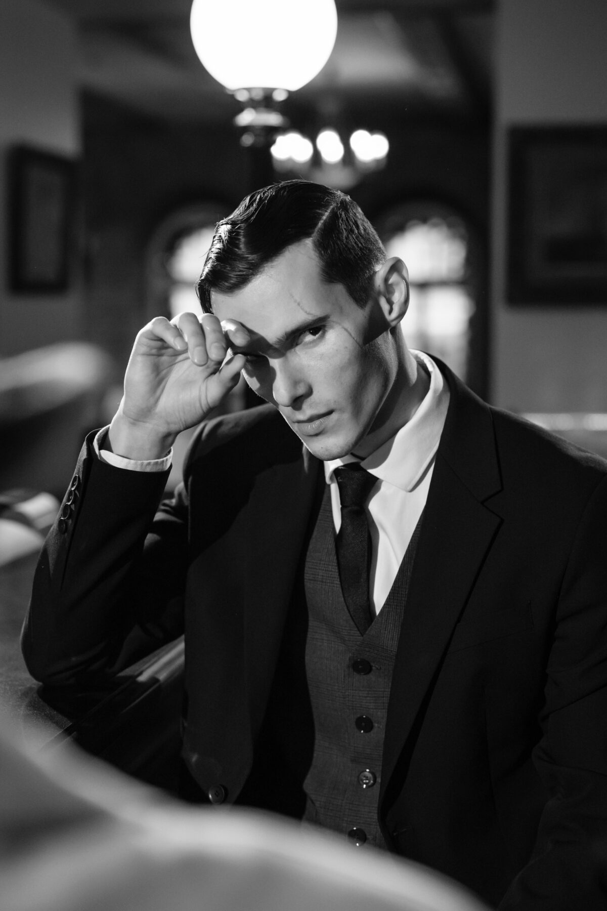 Black and White Photo of a man looking sinister.