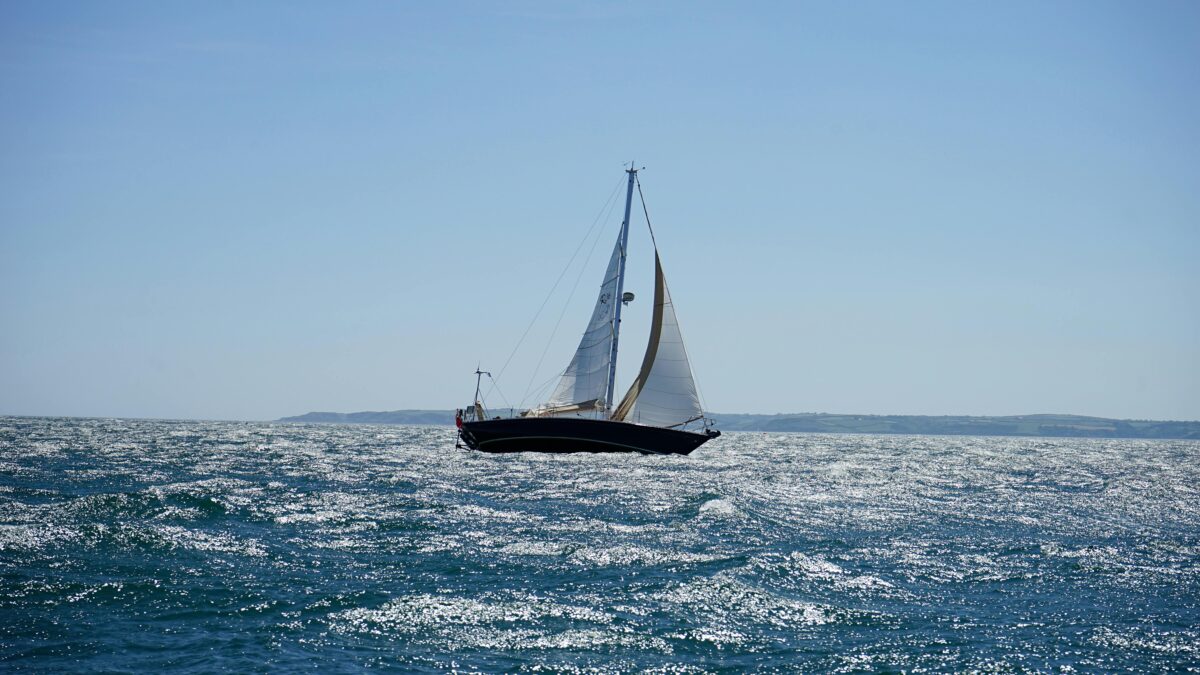 Sail boat battling the wind.