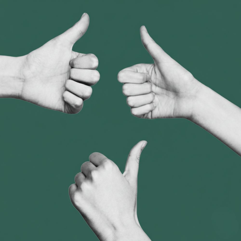 Three hands showing a thumbs up, arranged in a circle.