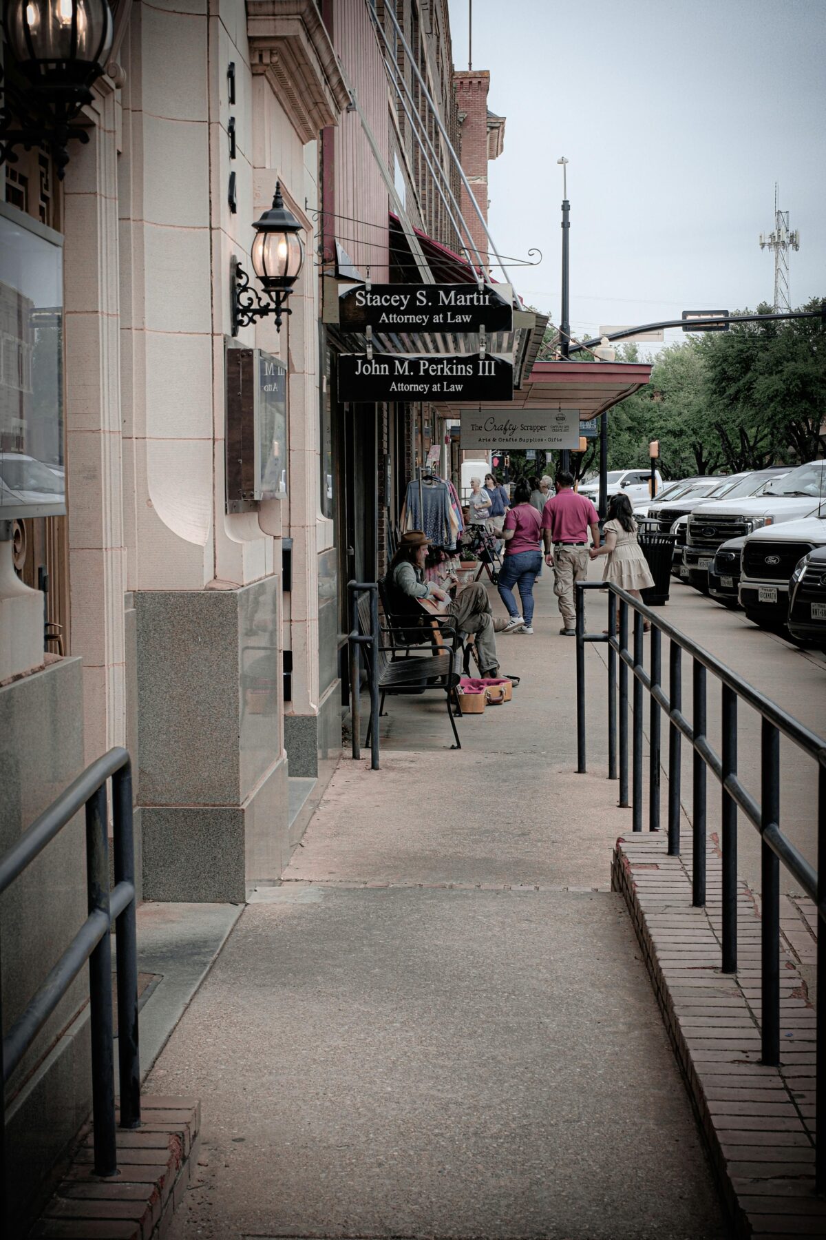 Mainstreet of a small town with signs for Attorneys.